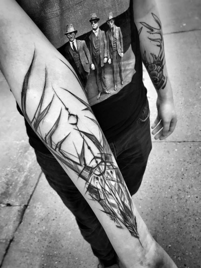 tattoo männer arm, schädel mit großem geweih, schwarz graue tätowierung, moderne tattookunst