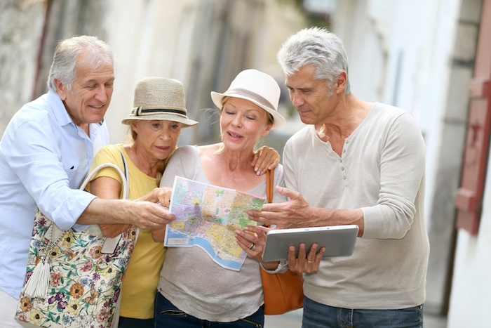 group of senior people traveling in europe