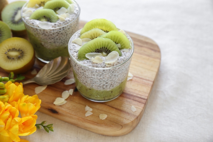 homemade chia pudding with kiwi and almond slices, easter breakfast idea