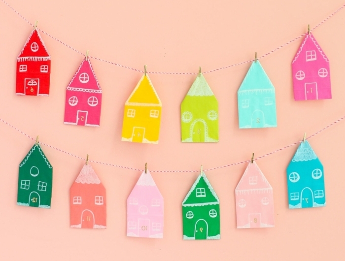 0 weihnachten basteln mit kindern zum advent girlande mit häuschen aus papier papierhäuschen in bunten farben wanddeko winter
