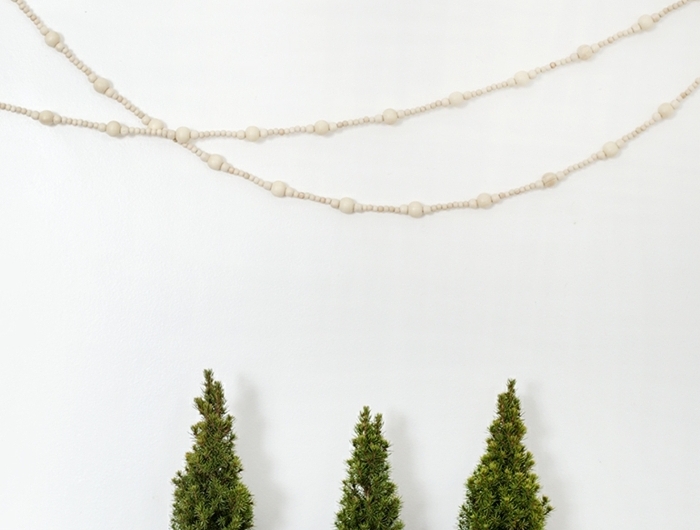 bastelideen für weihanchten diy deko weihanchtsdeko kleine bäume in schwarzen pflanzentöpfen moderne winterdeko