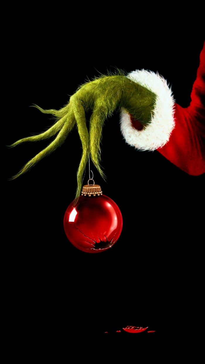 iphone bild weihnachten die schönsten hintergrundbilder wie der grinch weihnachten gestohlen hat grinch hält rote weihnachtskugel