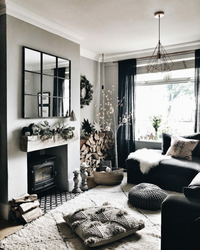 interior design schwarz graue farben wohnzimmer mit kamin was ist hygge einrichtung inspiration großer spigel