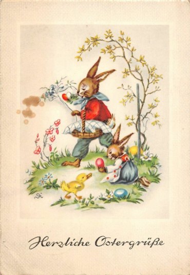 vintage bilder ostern brauner hase in roter jacke auf einer wiese osterbilder lustig kleiner hase spielt im gras