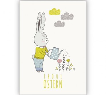 weißer angezogener hase gießt blumen frohe ostern ostergrüße lustige osterbilder kostenlos