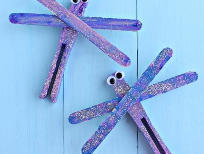 lila schmetterlinge aus eisstäbchen selber machen eisstiele basteln upcycling ideen holzstäbchen bastelideen für kinder