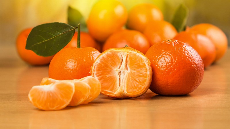 fresh tangerine on a wooden surface