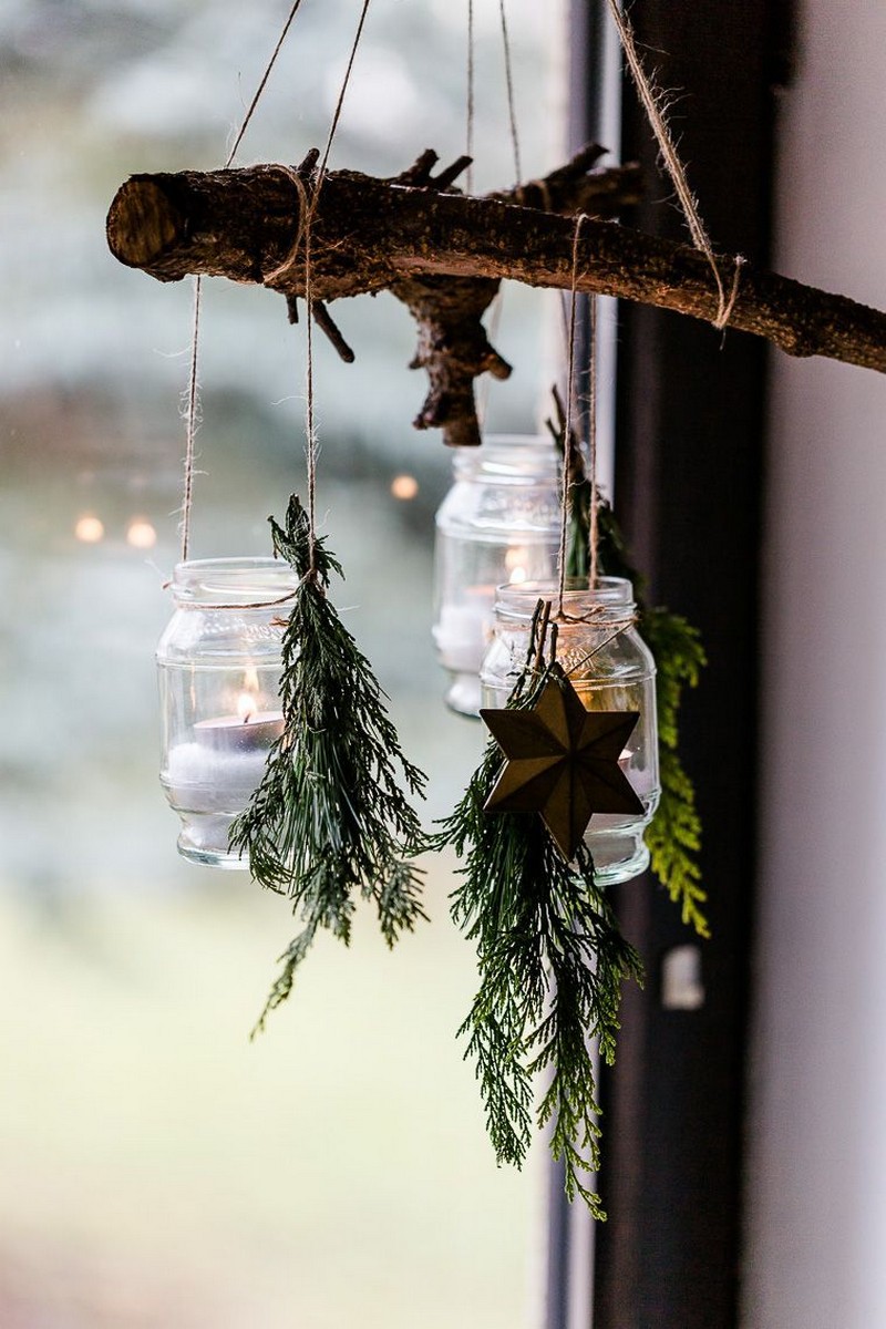 deko für fenster fensterbank weihnachtlich dekorieren fensterdeko mit glas laternen tannenbaum zweigen
