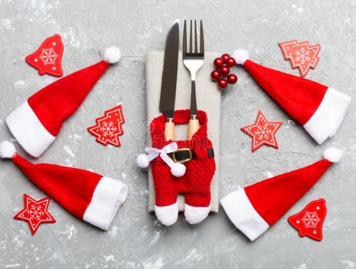 festive set fork knife cement background top view new year decorations santa clothes hat close up festive 160808145