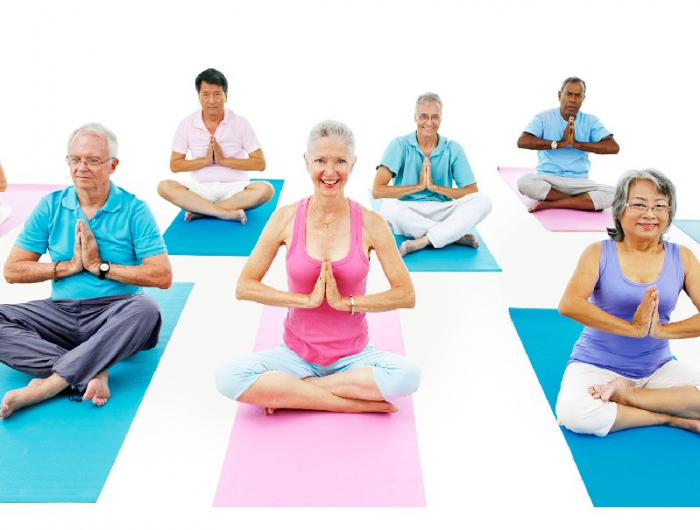 senior adult relaxation activity meditation yoga concept