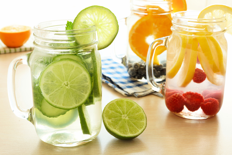 detox water with various types of fruit in mason jars