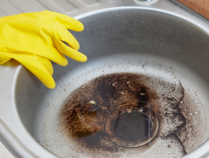 dirty sink at kitchen room. clean a sink drain. unclog a kitchen sink without a disposal