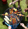 aerial view of a diverse group of friends grilling barbecue outdoors