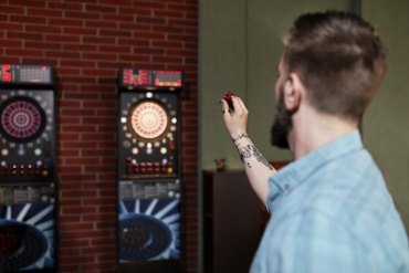 man playing darts