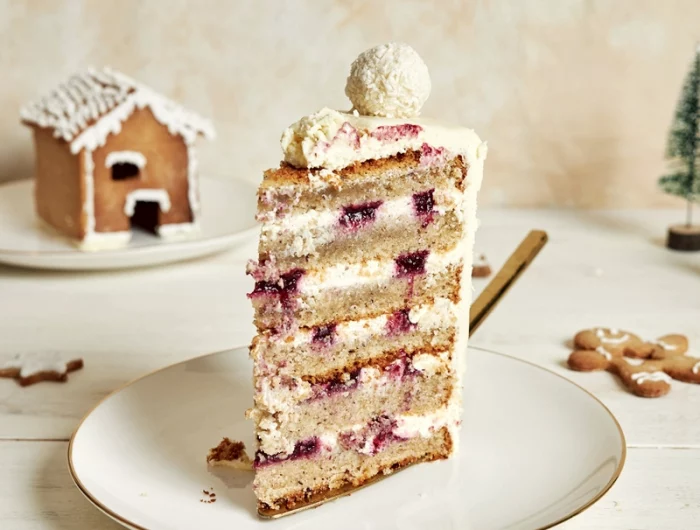 vertical shot delicious christmas cake with gingerbread decorations coconut almond ball