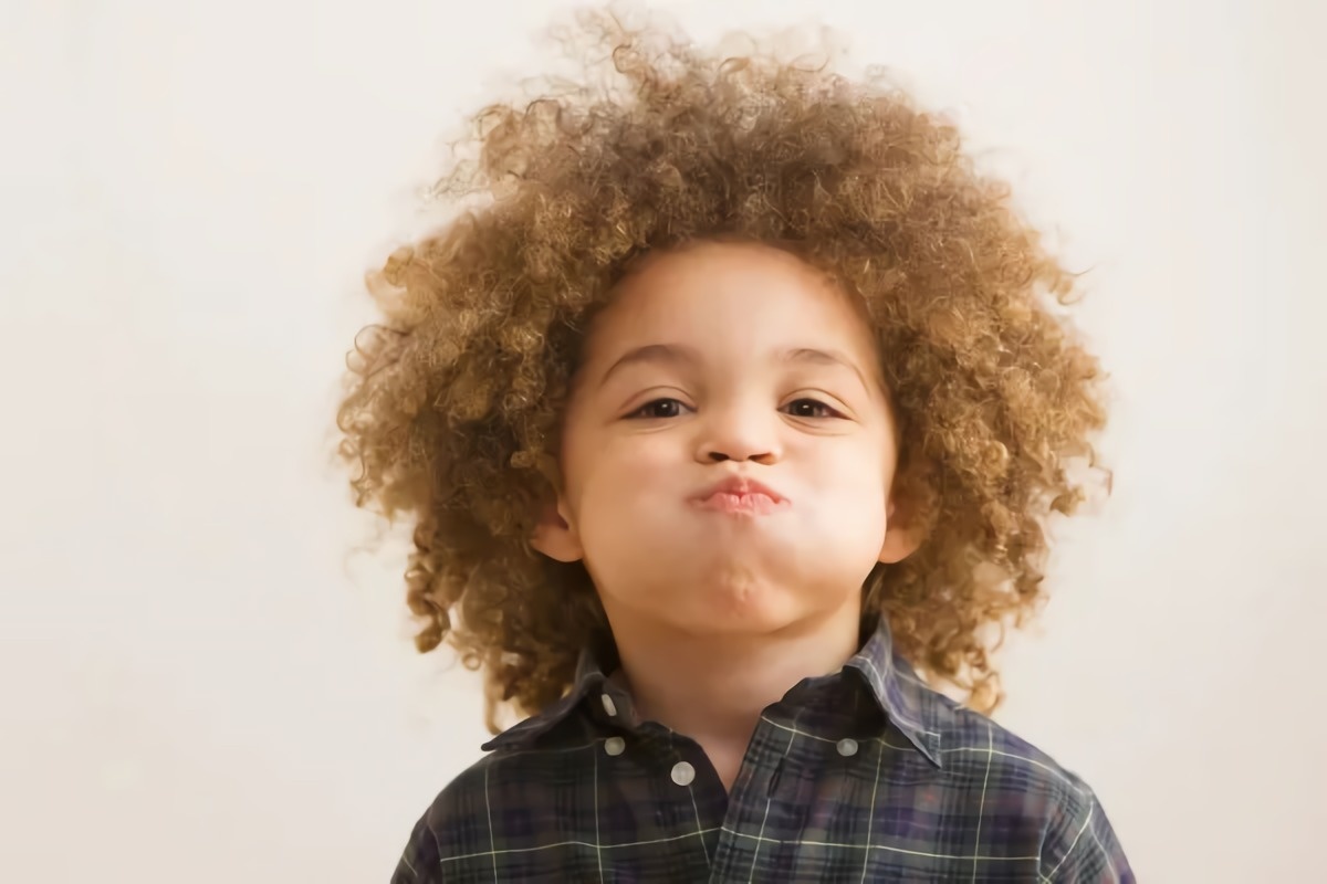 curly haired child holding breath 08fbef0a a8feda12a6e94e4084218bb8657d2876