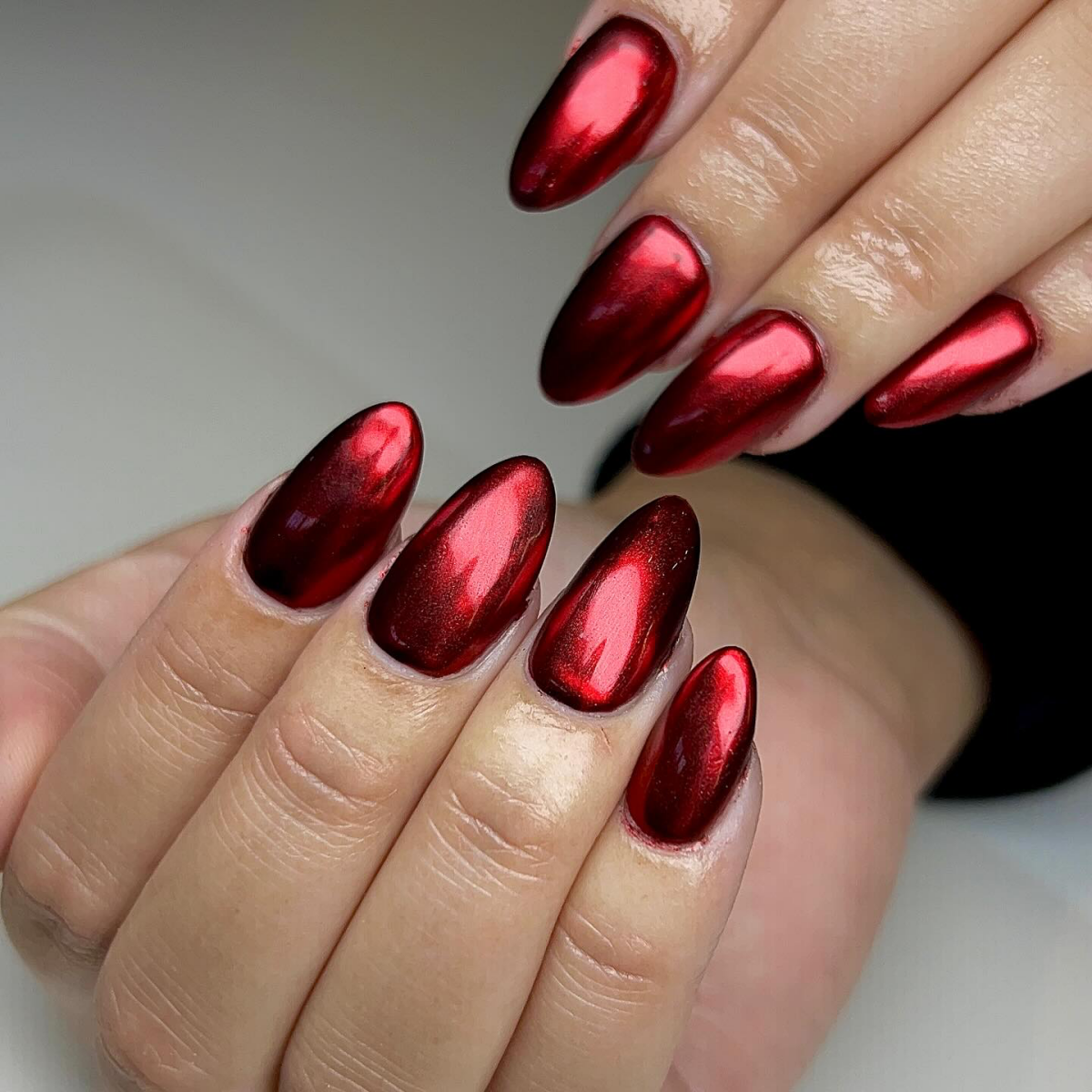 nailsbyemc.cle red chrome nails