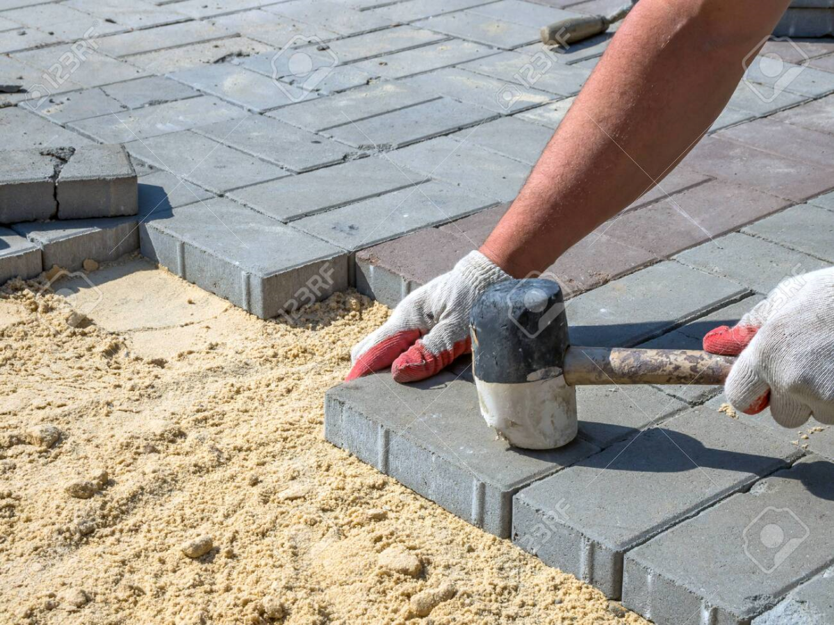 wie verlegen sie steine im garten richtig