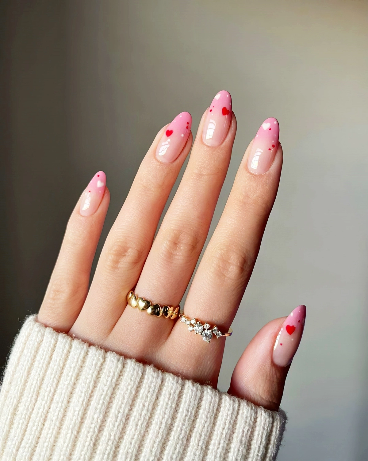 french nails lang rosa neegel mit herzen als motiv heluviee