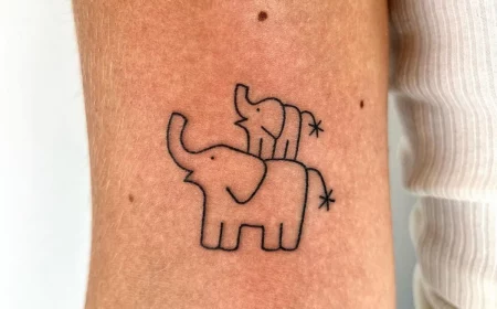 oberarm tattoo zwei elefanten groß und klein