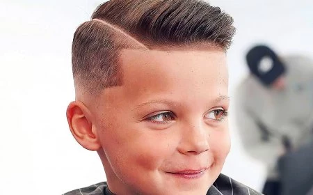 coole frisuren fuer jungs ab 9 kurzhaarftisur mit langem deckhaar und fade kieronthebarber