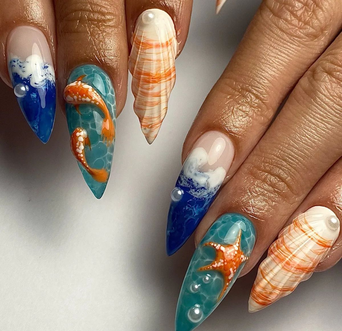 sommer nails design urlaub feeling muscheln seesterne fische