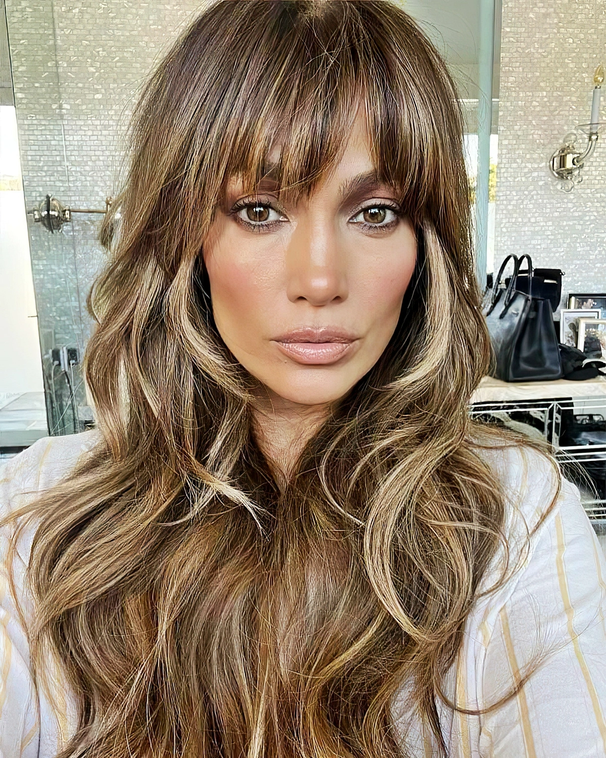 frisurentrends fuer mittellanges haar jennifer lopez shag cut 2025