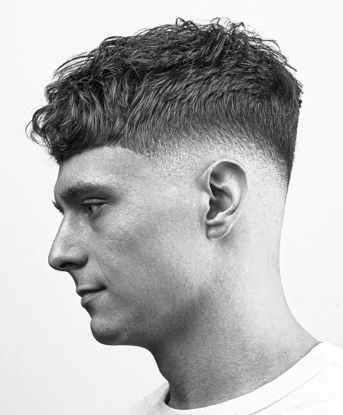 mid fade männer wellige dichte haare