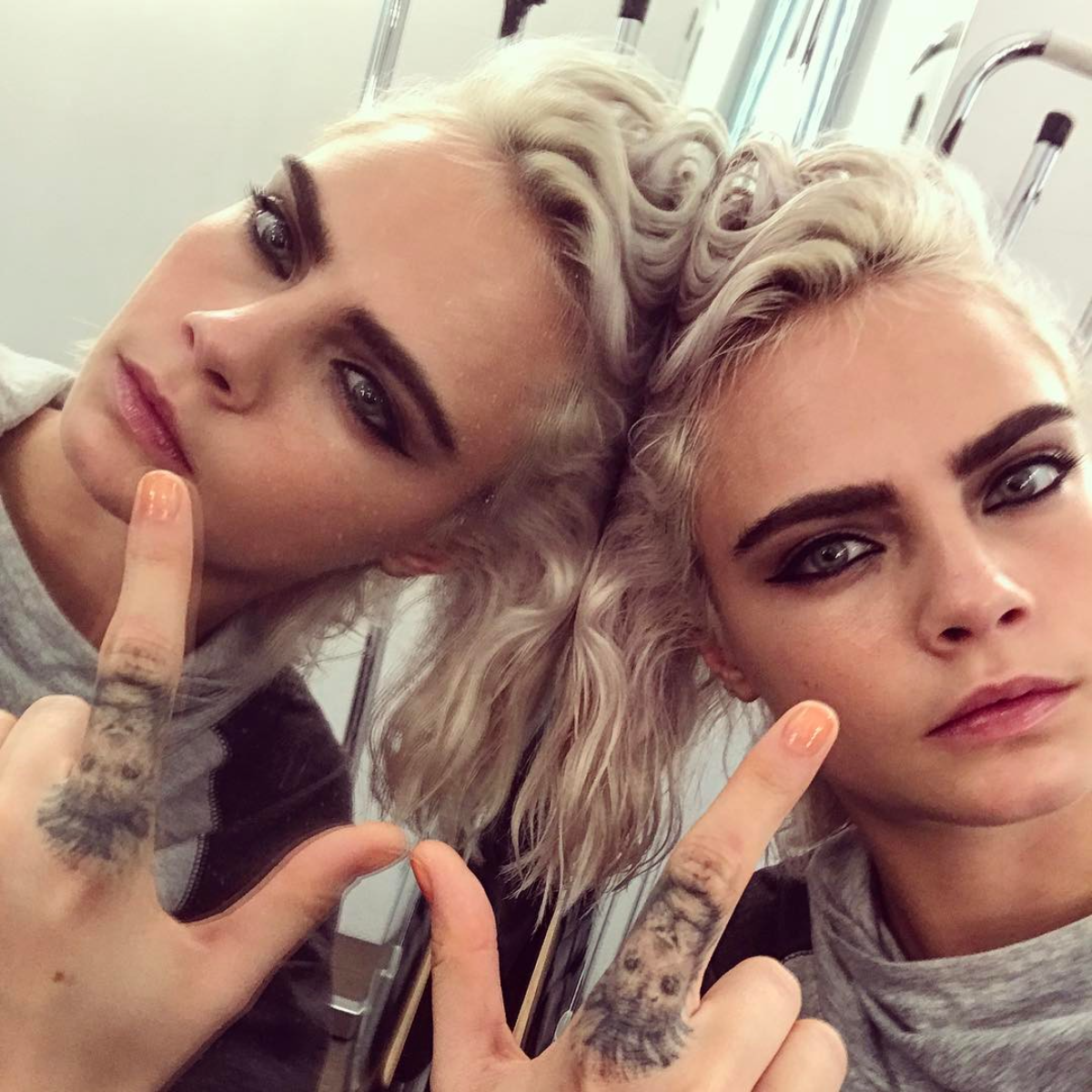 cara delevingnes hand tattoo