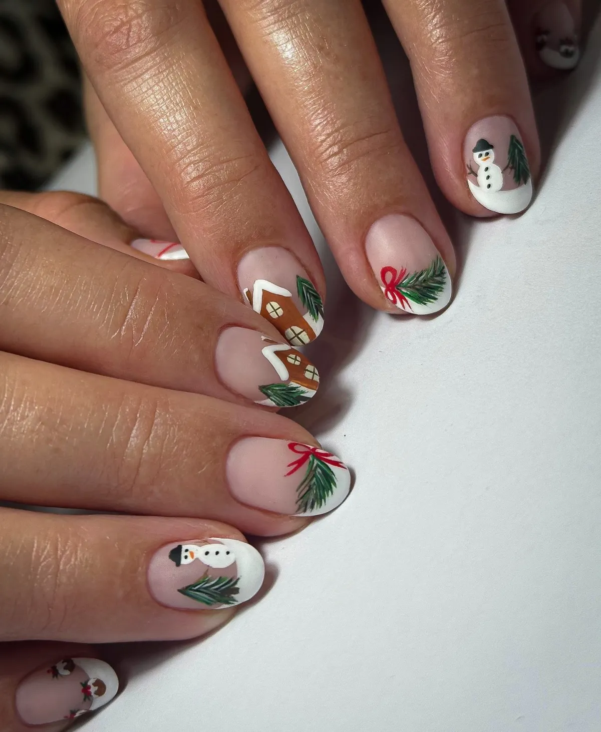 almond nails winterliche motive schneemänner weihnachtshäuschen